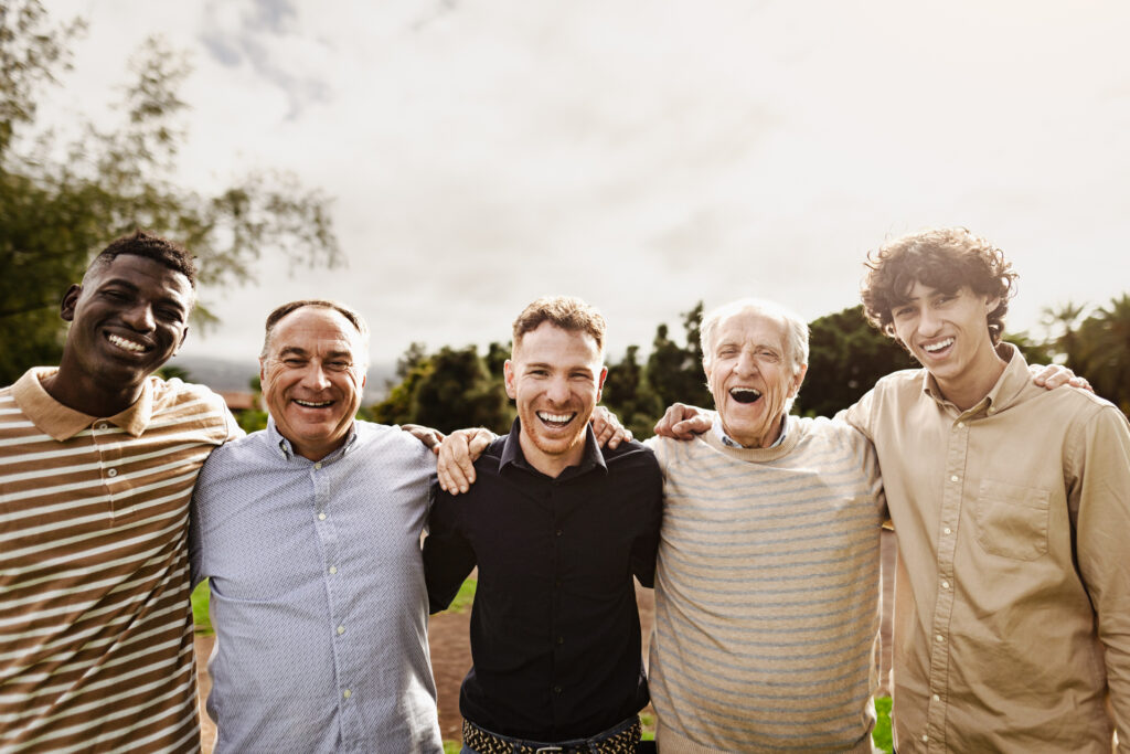 Happy multigenerational group of men with different ages and eth