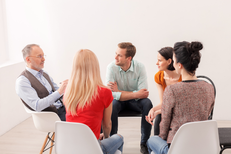 Young people on group therapy session