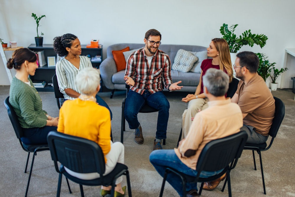 Cocaine addiction support group of various ages, genders, and races