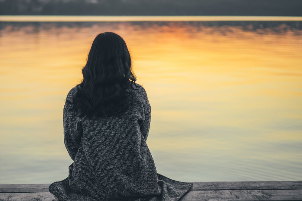 Woman looking out and contemplating drug addiction