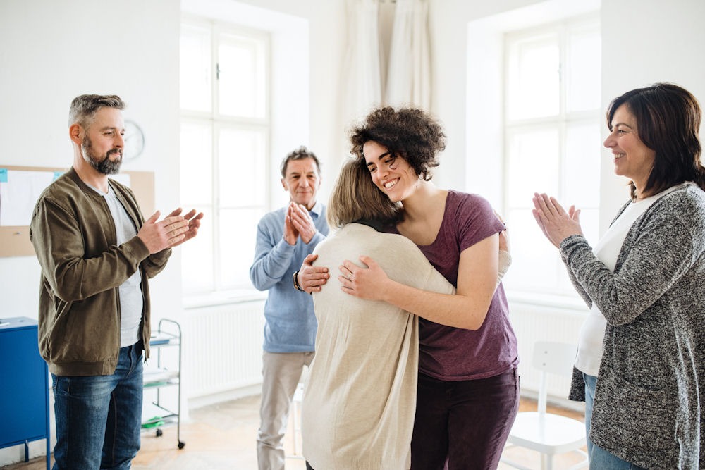 a group of patients standing during therapy